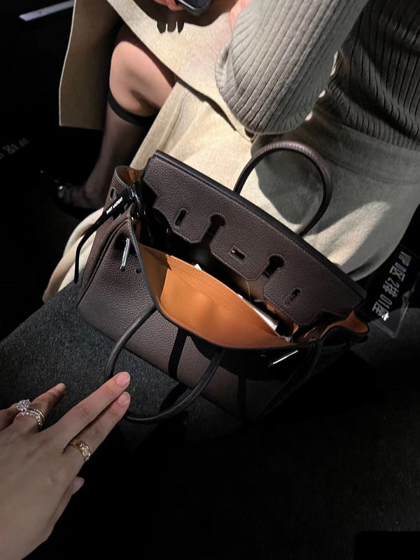 Side view of balanced structured handbag