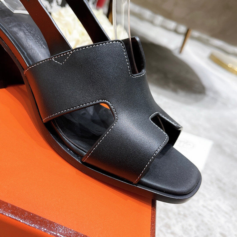 Hermès Red Bow-Detail Flats - Close-Up Texture View