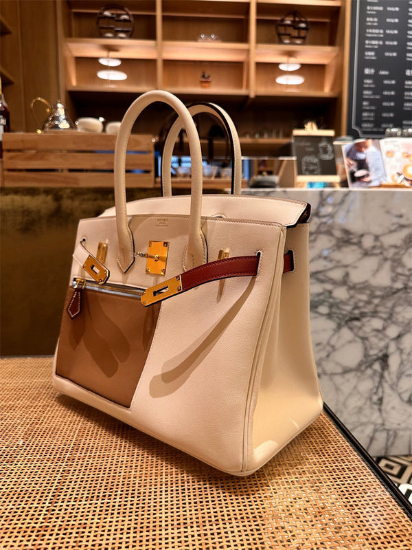  Signature tote bag carried on shoulder 16