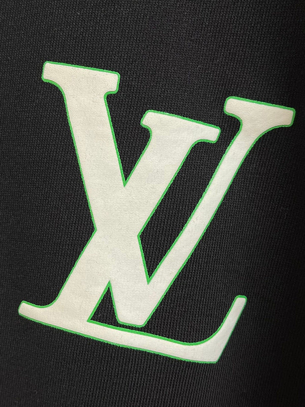 Flat lay presentation of Louis Vuitton luxury clothing with logo-detail design