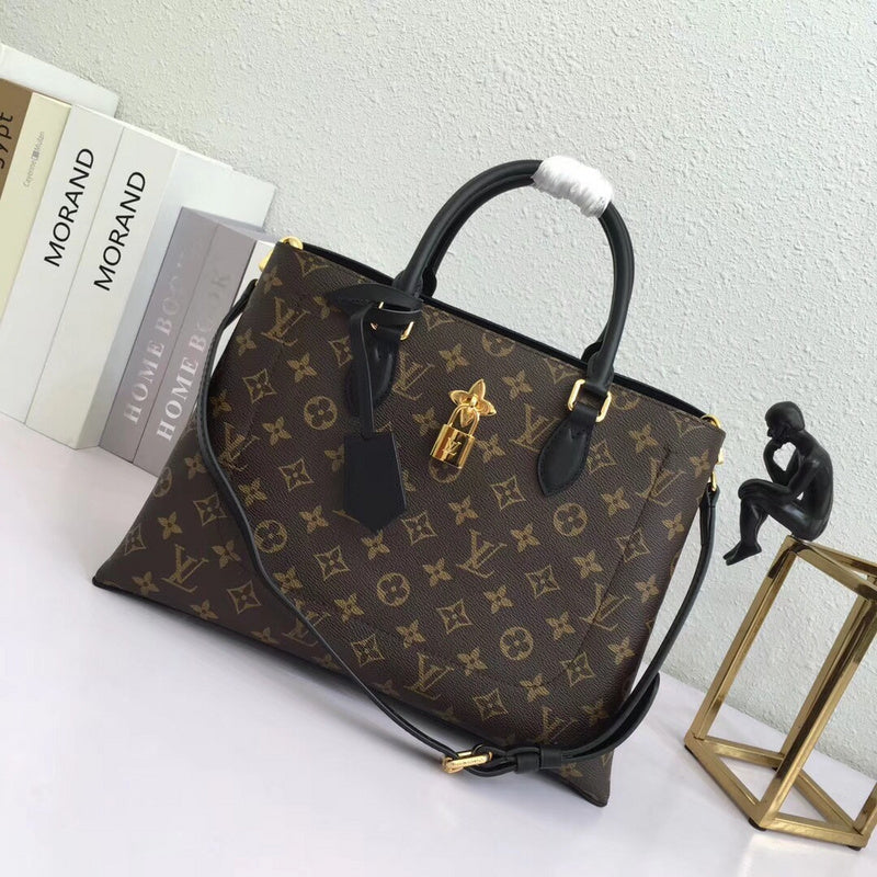 Front view of polished elevated women's handbag – women's luxury accessory