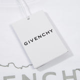 Flat lay presentation of Givenchy luxury clothing with monogram-inspired silhouette