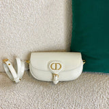 Side profile of premium sleek women's handbag – women's luxury accessory