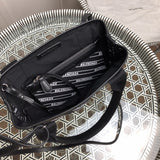 Close-up detail of chic polished women's handbag – women's luxury handbag