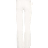Close-up of Bottega Veneta pants hardware and fine stitching