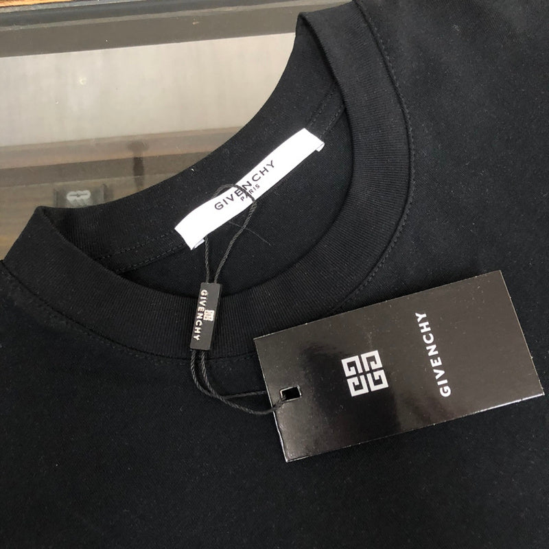 Flat lay presentation of Givenchy luxury clothing with relaxed-fit cut