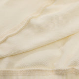 Side profile of Gucci luxury clothing with relaxed-fit cut