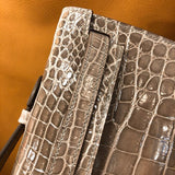 Side view of curated structured handbag
