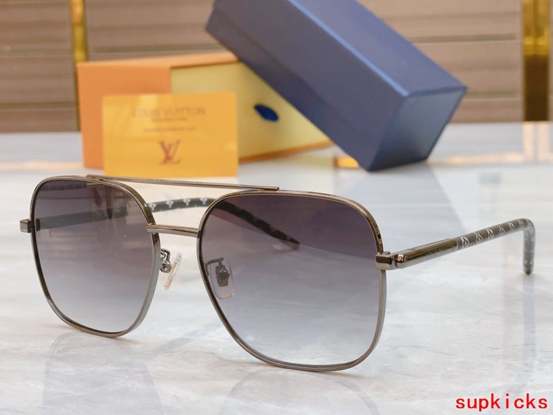Close-up detail view of Louis Vuitton unisex sunglasses