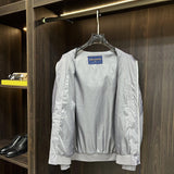Side profile of Louis Vuitton luxury clothing with label-forward styling
