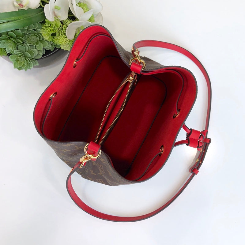 Styled lifestyle shot of modern sleek women's handbag – women's luxury handbag