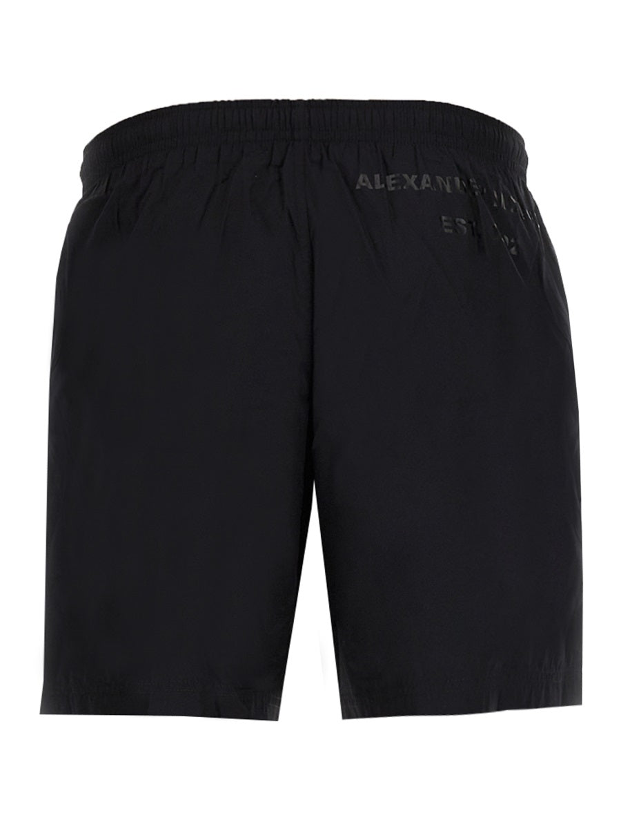 Close-up of Alexander McQueen swimsuits hardware and fine stitching