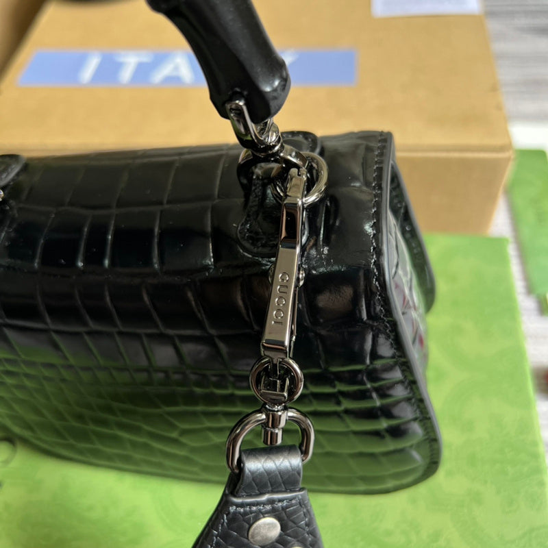 Handle and strap detail of everyday-luxe sleek women's handbag – women's luxury accessory