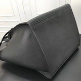 Top view of modern statement women's handbag – women's designer-style accessory
