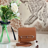Side view of clean-lined structured handbag