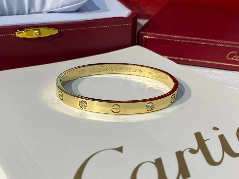 Side view of Cartier unisex jewelry piece