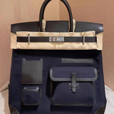 Side view of modern structured handbag