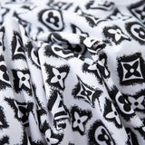 Side profile of Louis Vuitton cotton t-shirt with monogram-inspired silhouette