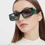 Side view of Louis Vuitton unisex sunglasses