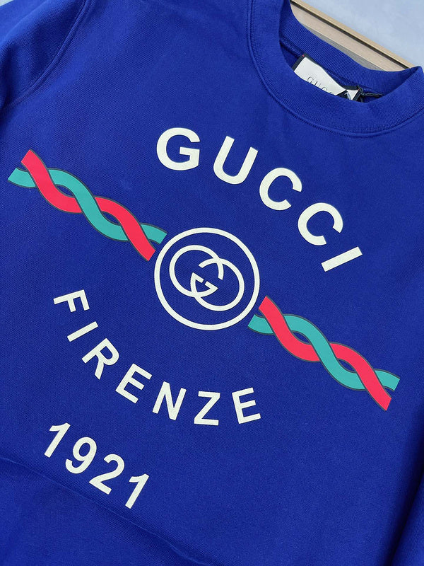 Full styled look of Gucci luxury clothing with logo-detail design