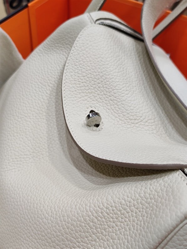  signature handbag styled with outfit