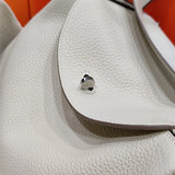 signature handbag styled with outfit