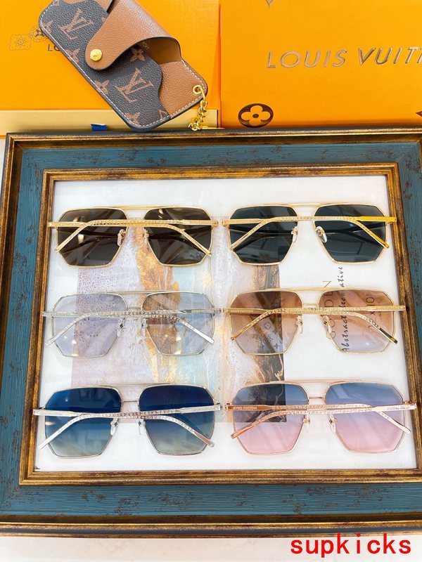 Close-up detail view of Louis Vuitton unisex sunglasses
