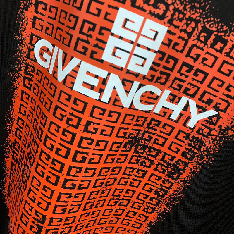 Flat lay presentation of Givenchy luxury clothing with monogram-inspired silhouette