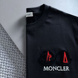Flat lay presentation of Moncler luxury clothing with everyday silhouette