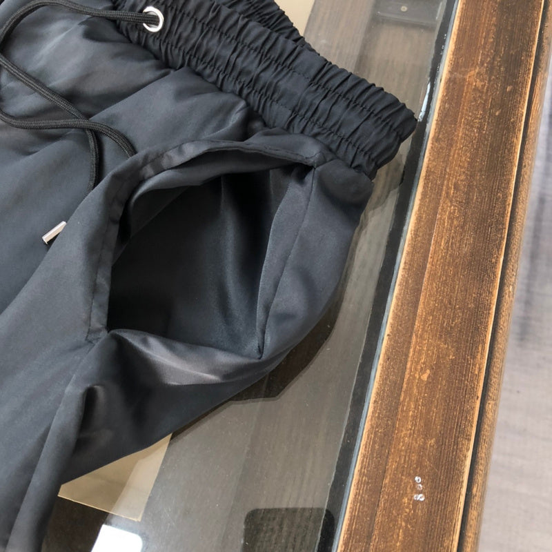 Side profile of Givenchy luxury clothing with signature branding