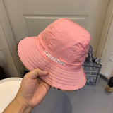 Angled view of Burberry unisex cap