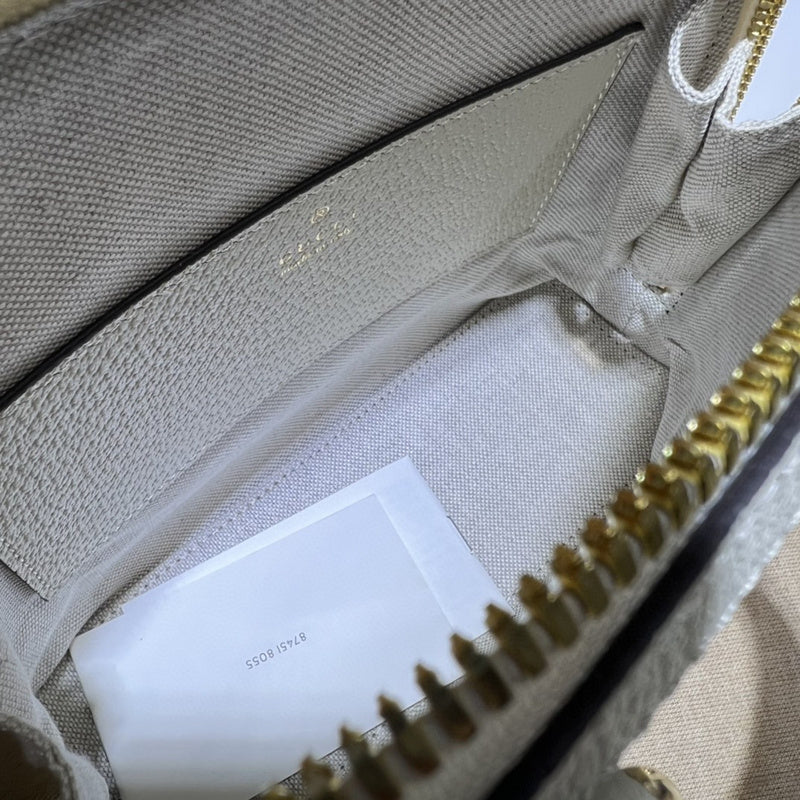 Handle and strap detail of everyday-luxe structured women's handbag – women's luxury handbag