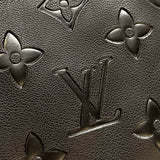 Side profile of Louis Vuitton luxury clothing with logo-detail design
