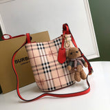 Ziva's Charm handbag – side angle view (one versatile size)