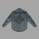 Close-up detail shot of Louis Vuitton luxury clothing with everyday silhouette
