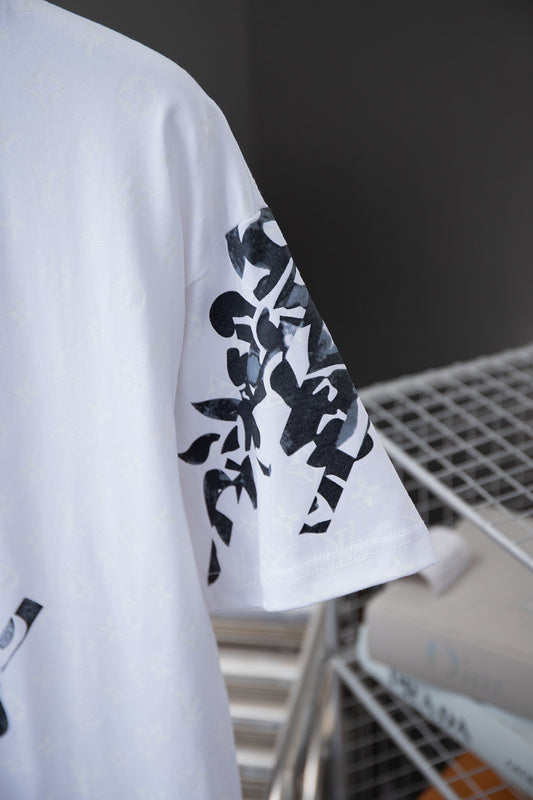 Flat lay presentation of Louis Vuitton cotton t-shirt with logo-detail design
