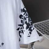 Flat lay presentation of Louis Vuitton cotton t-shirt with logo-detail design