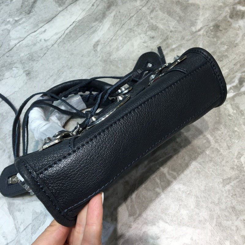 Sleek Vegan Leather Handbag - Refined Silhouette | Women's Statement Accessory #699 - styled full view (image 7) of designer-inspired handbag