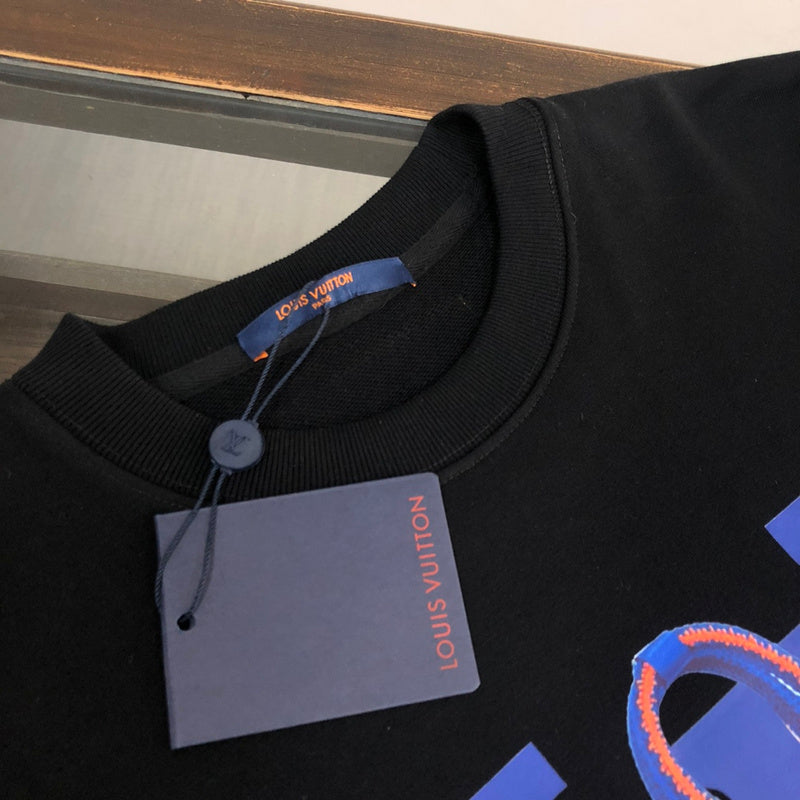 Full styled look of Louis Vuitton luxury clothing with signature branding