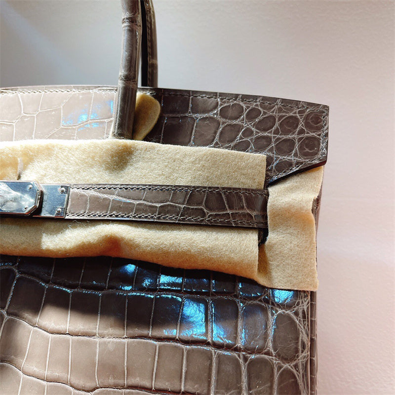  Tailored structured bag carried on shoulder