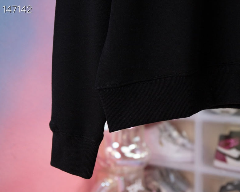 Flat lay presentation of Louis Vuitton luxury clothing with tailored silhouette