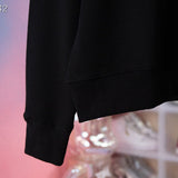 Flat lay presentation of Louis Vuitton luxury clothing with tailored silhouette