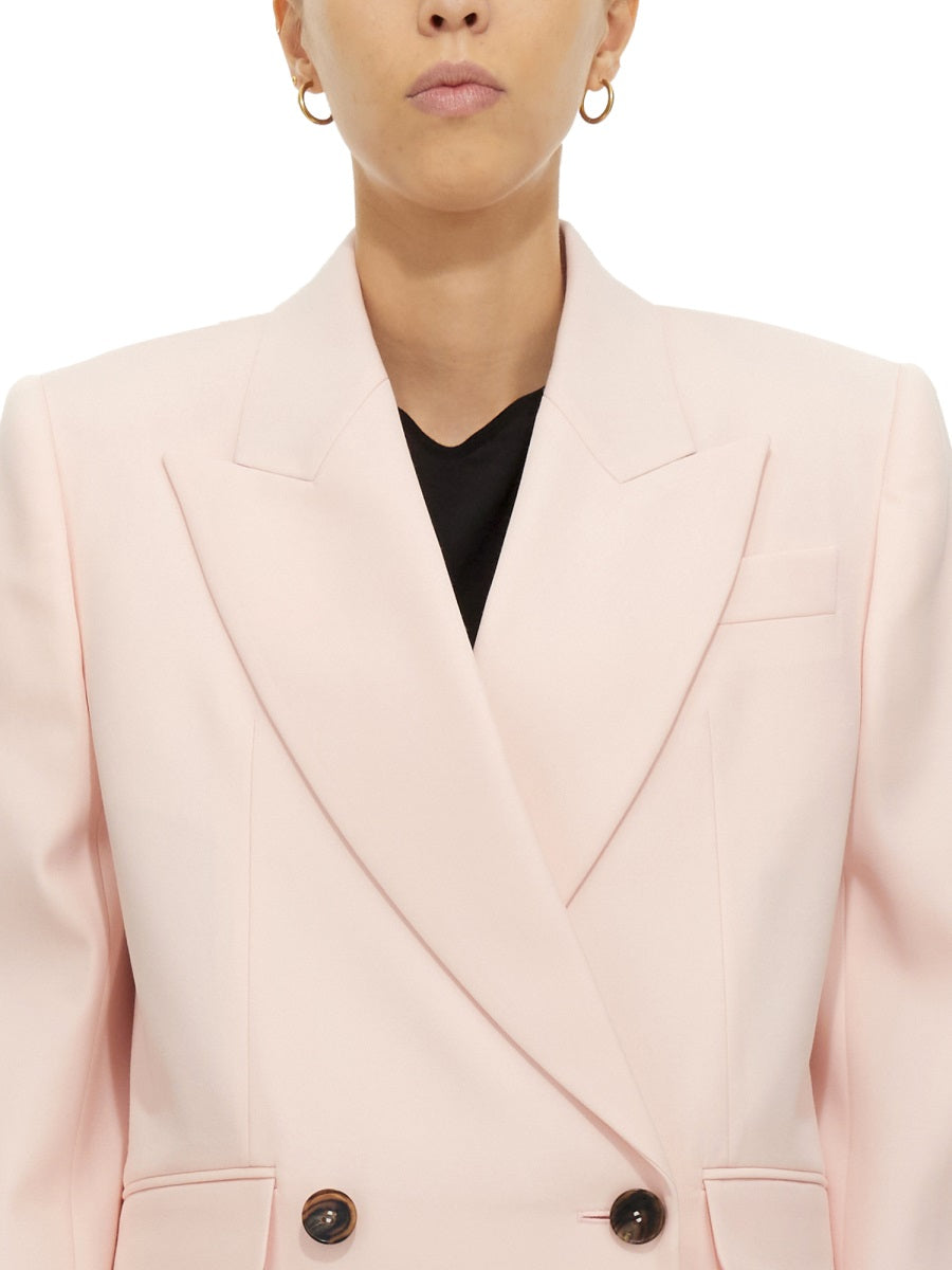 Close-up of Alexander McQueen jackets hardware and fine stitching