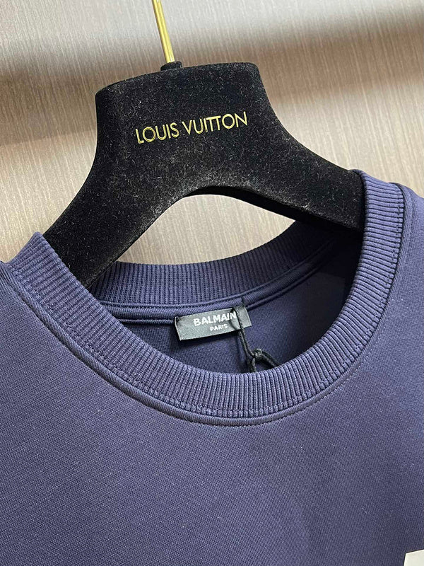 Close-up of Balmain designer clothing craftsmanship
