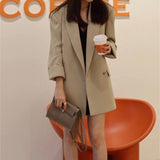 Side view of curated structured handbag