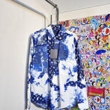 Close-up detail shot of Louis Vuitton luxury clothing with everyday silhouette