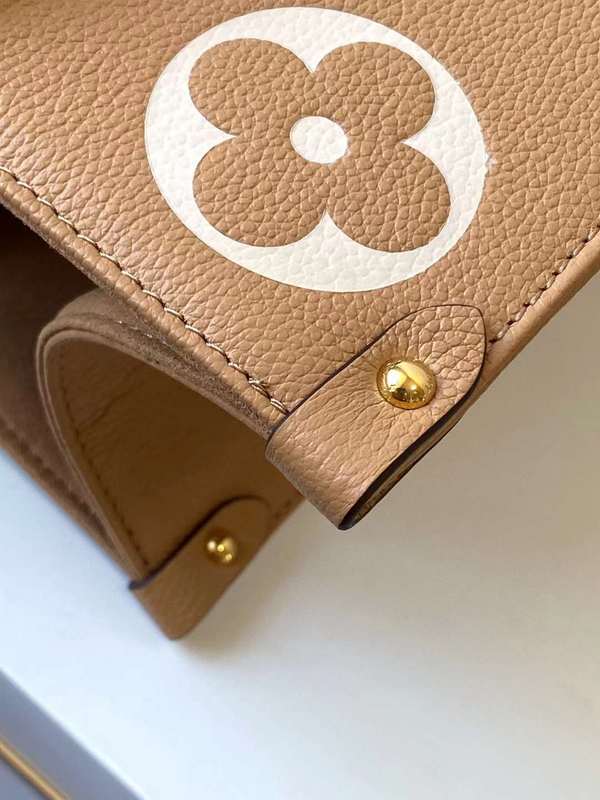 Front view of classic structured women's handbag – women's designer-style accessory