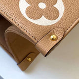Front view of classic structured women's handbag – women's designer-style accessory