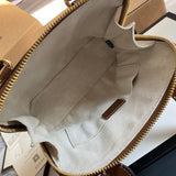 Side profile of elevated signature women's handbag – women's premium purse