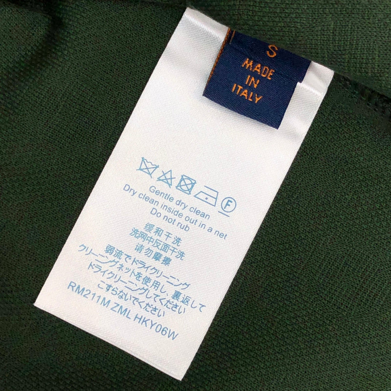 Flat lay presentation of Louis Vuitton cotton t-shirt with label-forward styling